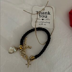 Elegant Black and Gold Bracelet